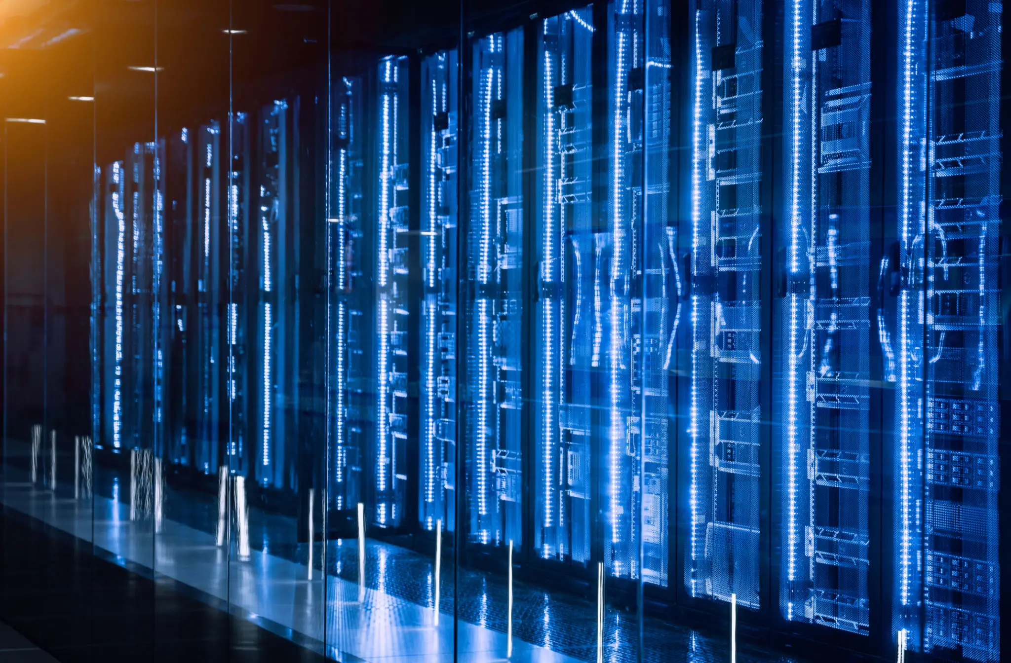 Blue-lit server racks in data center