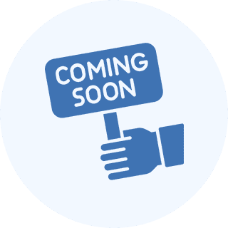 Hand holding "Coming Soon" sign